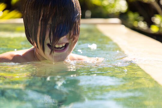 teen age girl in pool relaxing, Vilankulos, Mozambique,Africa