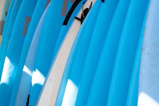 abstract of colorful surf boards stacked up