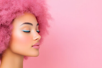 Naklejka premium Profile portrait of young woman with bright pink afro hair, Colorful eye makeup, Pink background with copy space, Fashion beauty close up
