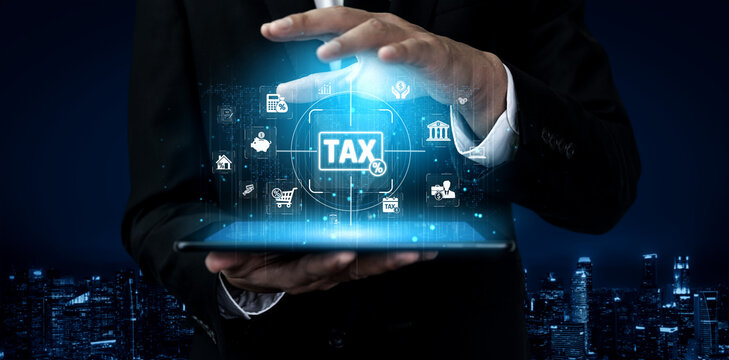Businessman in Suit Presenting Tax Digital Concept with Modern Technology in Urban Setting Sigmoid