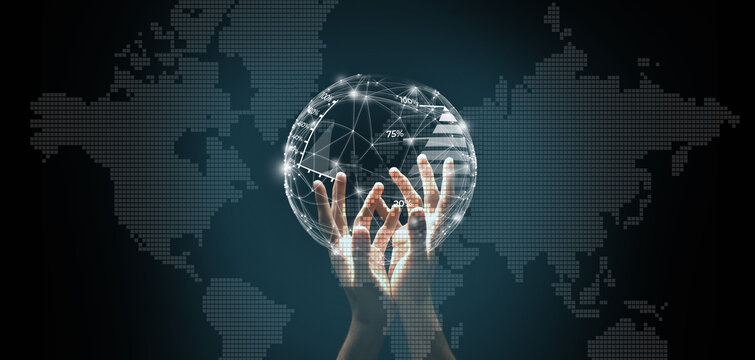 Hands reach up to hold a digital globe that shows data connections across the world. A map is visible in the background, emphasizing global technology and communication.