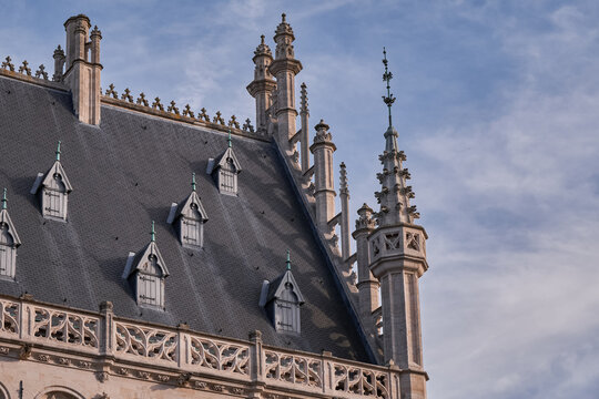 Ornate slate roof and dormers of the Gothic Stadhuis - Leuven, Belgium