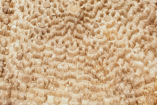 Muqarnas dome in alhambra showing intricate islamic architecture details and geometric patterns in granada, spain