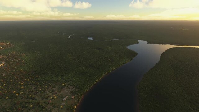 Side aerial drone view at sunset of Cestos River. Liberia