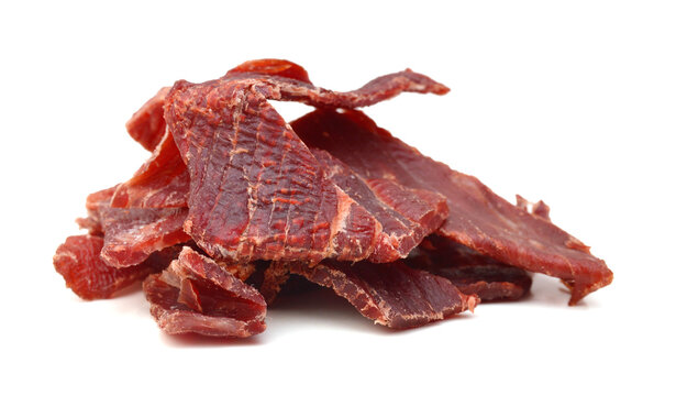 Beef jerky pieces on white background
