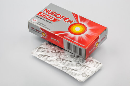 Nurofen Forte Ibuprofen pills pack and blister closeup against white.