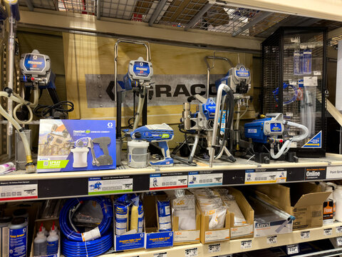 Prosper, Texas, USA - April 1st, 2026: Professional Graco Magnum X5 and X7 airless paint sprayers sitting on warehouse shelving units in The Home Depot