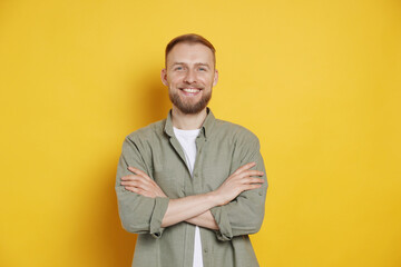 Fototapeta premium Portrait of handsome man on orange background