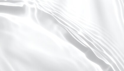 Obraz premium A close-up shot showcases flowing white fabric, creating a soft and elegant abstract texture with subtle highlights and shadows.