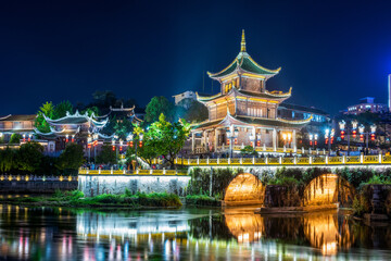 Obraz premium The night view of Jiaxiu Tower in Nanming District, Guiyang City, Guizhou Province, China