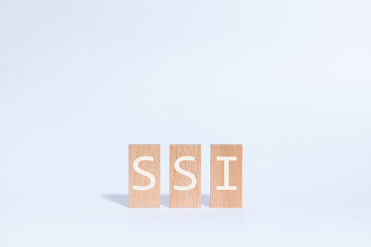 Eye-catching image of SSI text on wood blocks. The word stands for Self Sovereign Identity.