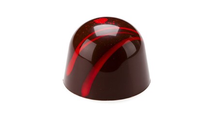 Fototapeta premium A close-up shot of a single, delicious chocolate truffle decorated with red stripes