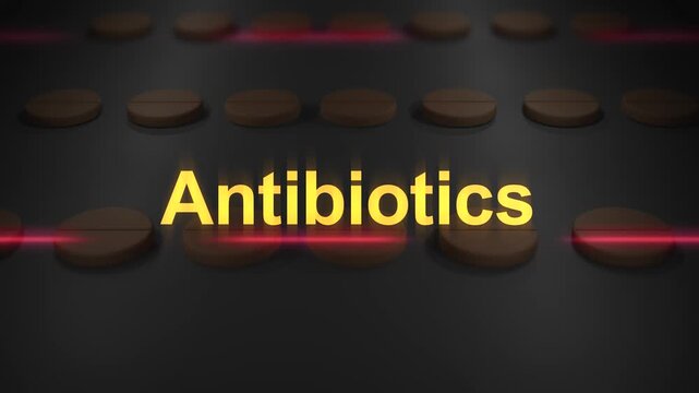 Typography over Chewable Pills on Conveyor Belt - Antibiotics