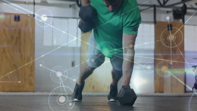Starting from high plank, man doing pushups, alternating dumbbell rows with HUD for core strength