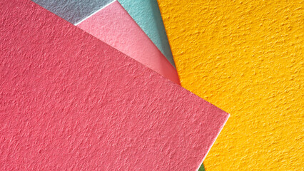 Fototapeta premium Multicolor abstract background with paper texture. Textured colored paper with Suprematist geometric shapes and lines.