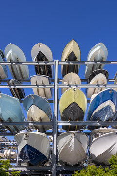 Boats storing on a vertical dry stack marina rack