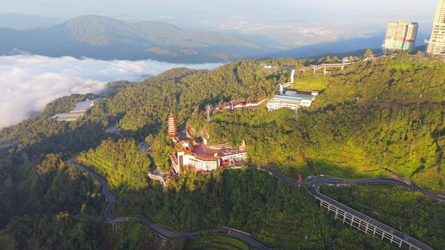 Aerial view of Chin Swee Caves Temple nestled in vast greenery, Malaysia