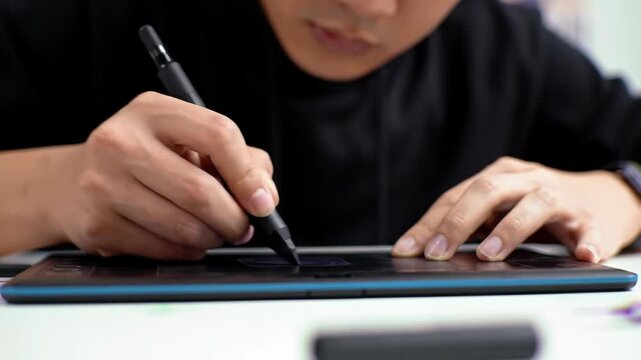 Person Using Graphics Tablet.