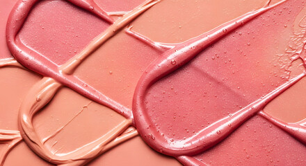 Fototapeta premium Liquid lip gloss and creamy blush texture smears with bubbles. Peach and pink cosmetic swatches