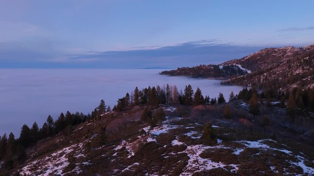 drone flying above the inversion in the mountains