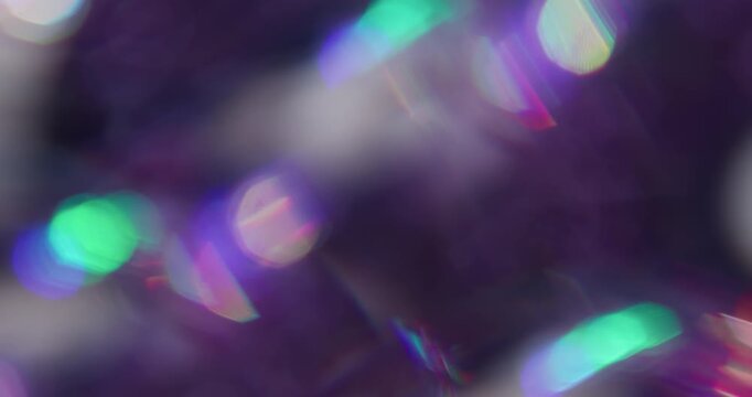 Defocused luminosity. Leak lens. Neon color reflection spin texture. Purple blue violet fluorescent bokeh light abstract background.