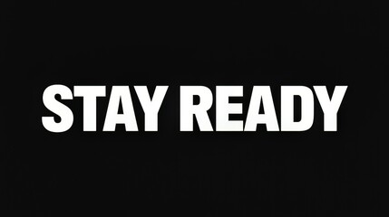 Obraz premium Bold motivational typography poster with stay ready quote on black background for business and lifestyle