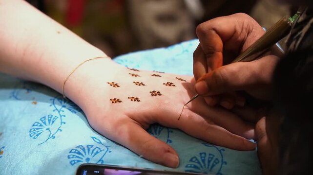 Beautiful mehendi design in the hands of a desi girl in India