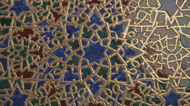 Intricate geometric golden Islamic tile pattern with blue and green accents, detailed mosaic texture background, rich cultural design