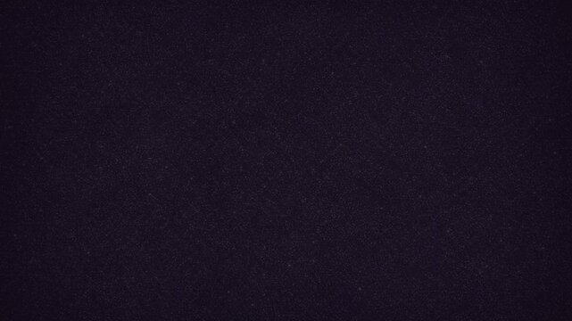 Authentic 35mm film grain overlay with fine monochromatic noise and organic dust particles on a black background, perfect for adding a vintage cinematic look to video projects.