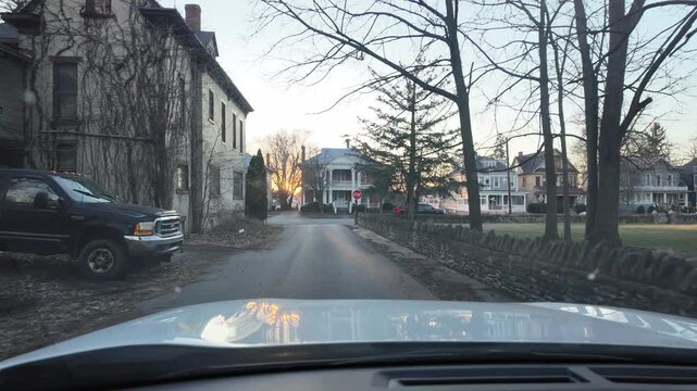 Driving Through a Toledo Neighborhood at Sunset