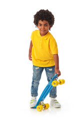 Child posing with skateboard, smiling in casual outfit, isolated on white background