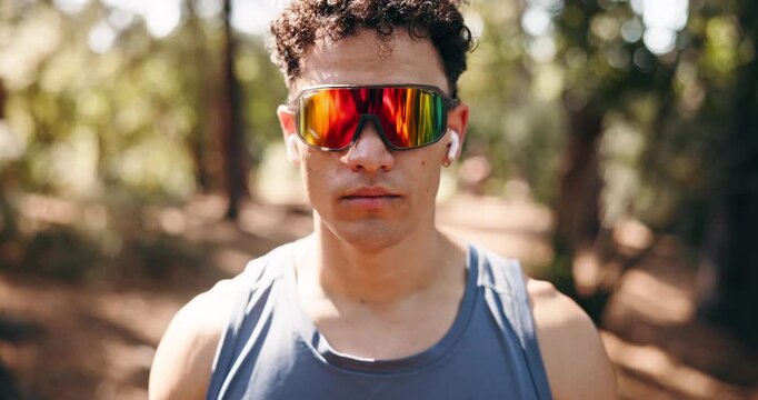 Fitness, break or man in nature with sunglasses, cardio fatigue or breathing in intense practice. Exercise, bokeh or runner outdoor with eyewear, training pause and recovery for performance goals.