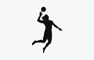 Obraz premium A silhouette of a triumphant hiker standing on top of a mountain peak with a raised walking pole