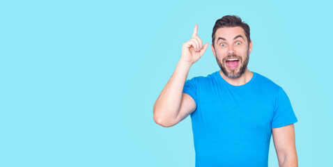 Idea moment with excited man showing idea gesture. Inspiration expression during idea discovery....