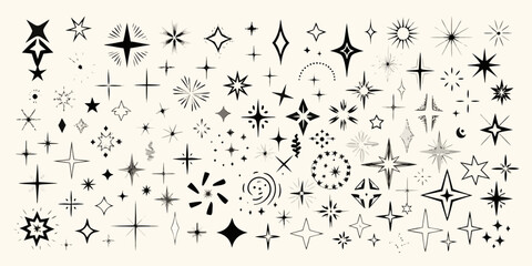Obraz premium A multitude of black starbursts sparkles and celestial design elements