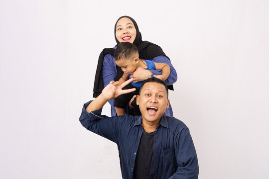 the father say hai to camera photo action in studio photo