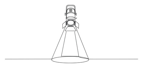 Fototapeta premium A continuous line drawing of a stage spotlight casting a focused beam of light onto a surface, perfect for creating dynamic visual effects, event promotions, or theatrical production