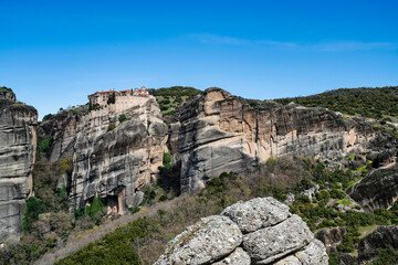 Fototapeta premium Varlaam Monastery Perched on Massive Rock Formation in Meteora Greece