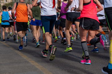 Fototapeta premium Large group of runners running marathon race in Rome