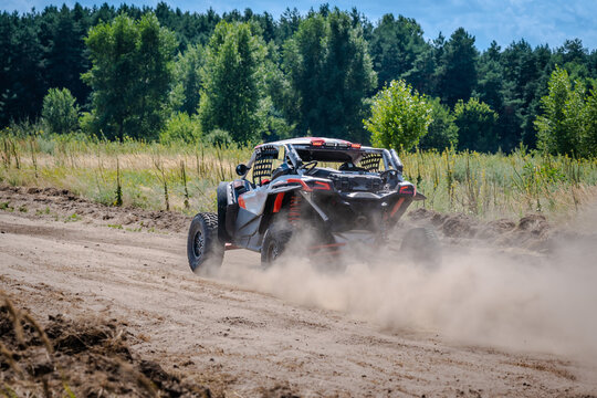 UTV buggy, rally or 4x4 in the action on sand