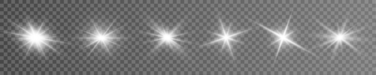 Magic stars flare shines with soft golden white glow. Spark particles drift slowly around radiant center core. Ideal for Christmas graphics use. © dedstock