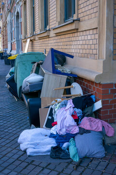 Bulky waste apartment clearance recycling standing on the footpath in the city vertical
