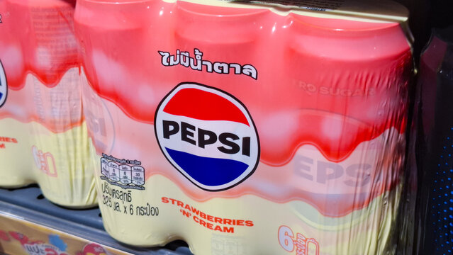 Pepsi Strawberries and Cream zero sugar carbonated soft drink six pack cans in plastic wrap packaging on a retail store shelf on April 8, 2026 in Bangkok, Thailand