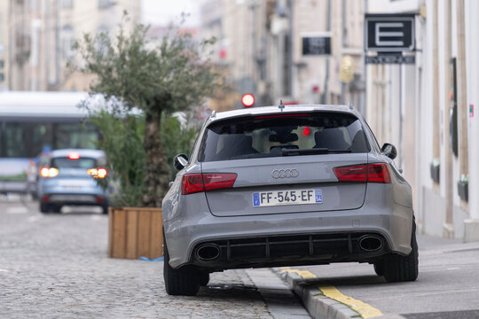 Nancy, France - January 2nd 2021 : View on a grey Audi RS6 Avant C7 finished in Nardo grey parked on a street with buildings in the background.