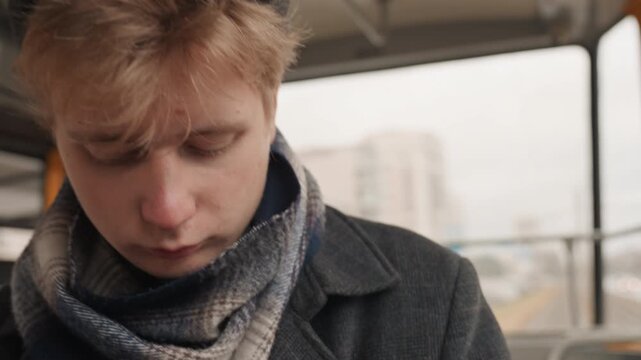 White man studying book with focus, vintage interior and soft light, coat and scarf, thoughtful gaze and quiet reflection, novelist and editor roleplay, manuscript dreams in motion