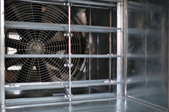 Close-up shot of flaps of fire, volume damper and ventilation fan.
