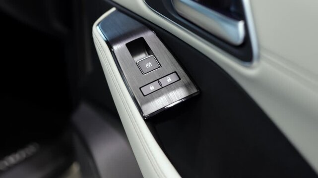 Smart driving interface featuring control panel with buttons and switches inside a modern vehicle, showcasing sleek design and advanced automotive technology