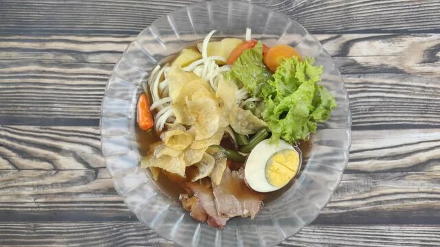 Selat Solo is a dish from Surakarta, Central Java, with European influences. The main ingredient is beef that is braised and served in a sweet, thin Javanese gravy, along with vegetables and potatoes.