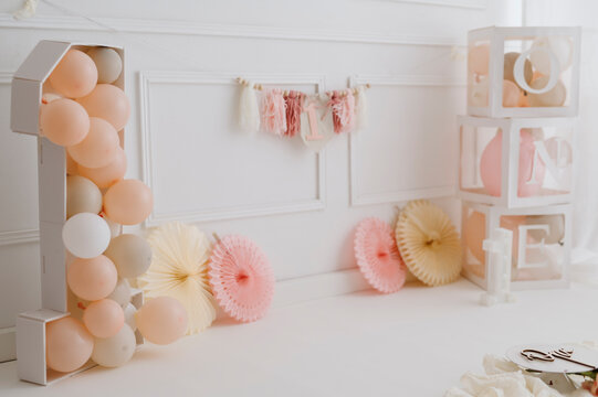 First birthday girl decoration with pastel balloons and number one