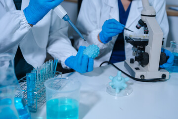 Fototapeta premium Medical test vaccine research and development concept. Scientist in laboratory study and analyze scientific sample of antibody.